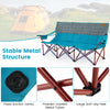 Three-person folding camping chair in blue with cotton padding, cup holders, and stable metal structure for outdoor use.