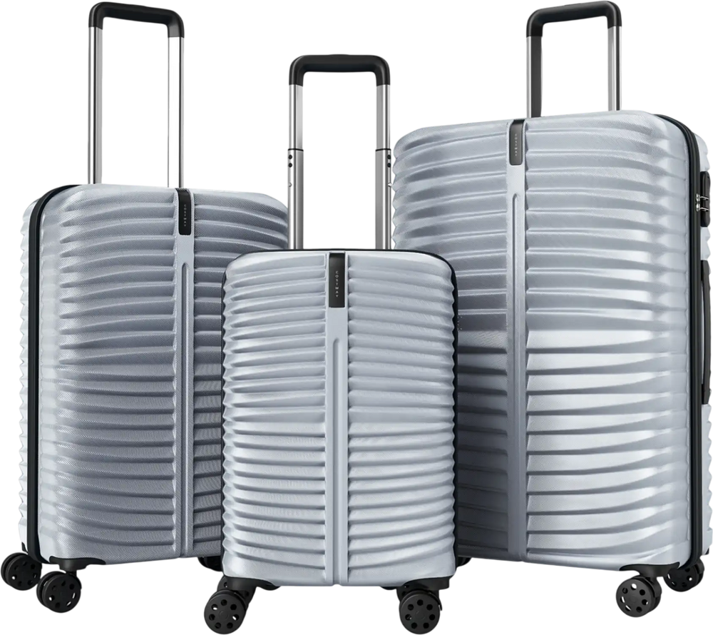 Three-piece gray hardside luggage set with 8-spinner wheels, featuring nesting design and durable ABS material for.