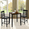Counter-height dining table with a natural rubber wood top and two black chairs, perfect for cozy dining nooks.