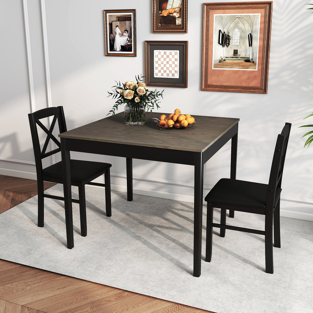 Gray wooden square dining table set for 2 with ergonomic chairs, ideal for small spaces like kitchens or apartments.