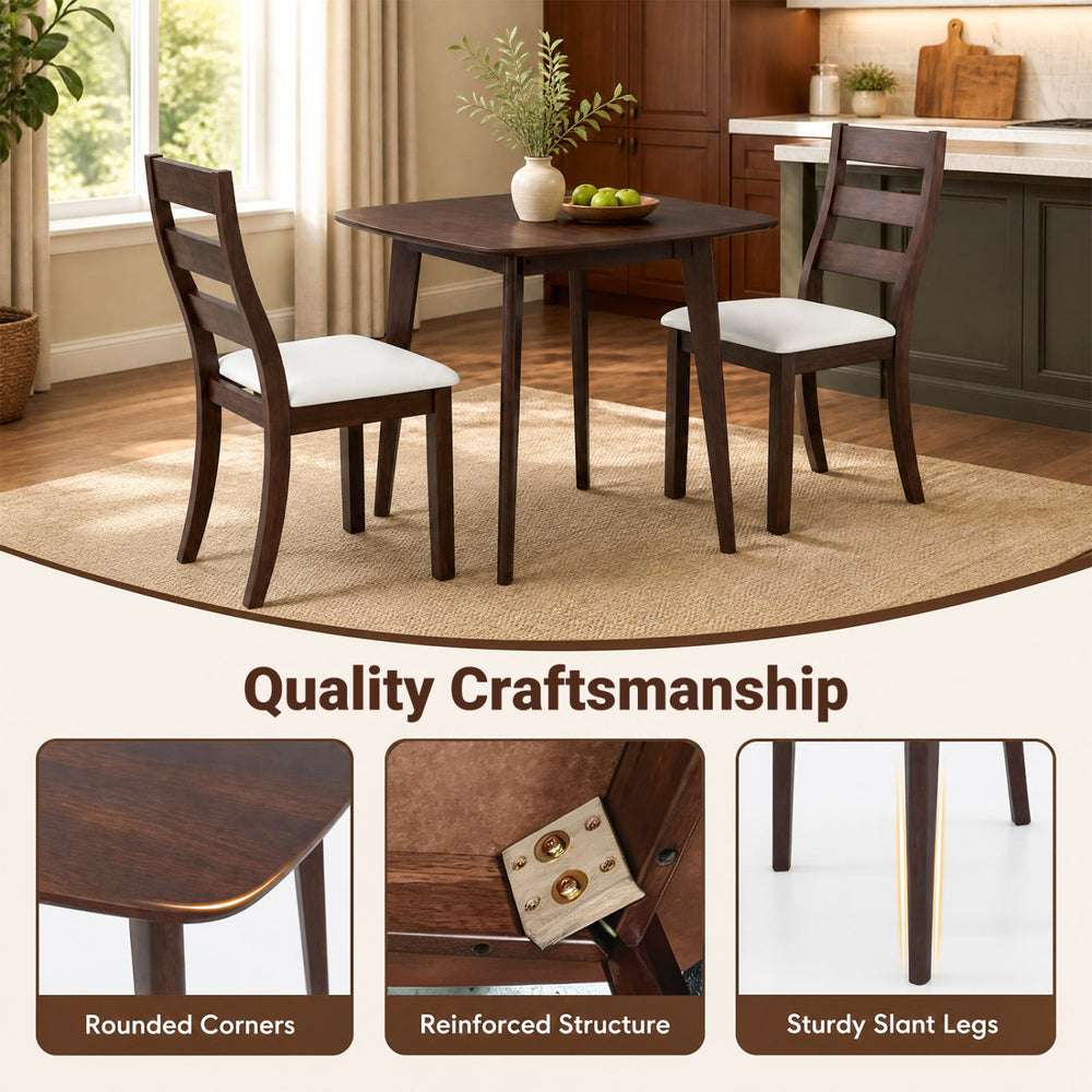 3-piece dining table set with walnut finish, featuring a sturdy rubber wood frame and cushioned faux leather seats.