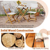 Folding patio bistro set featuring acacia wood chairs and table, ideal for outdoor use and space-saving storage.