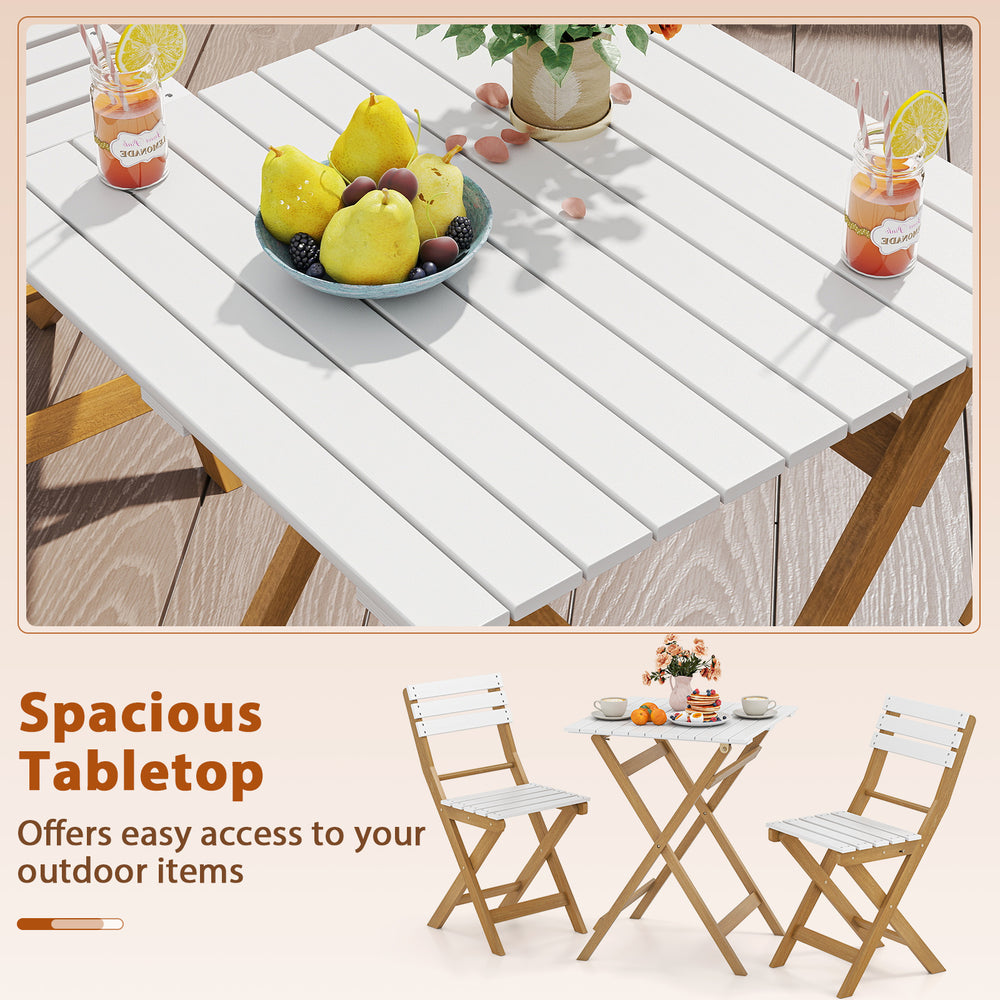 Folding patio bistro set featuring a spacious white tabletop and acacia wood chairs, perfect for outdoor relaxation.