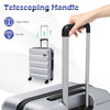 Telescoping handle of a gray 3-piece hardside luggage set, showcasing its sturdy and adjustable design for easy.