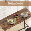 Rustic brown industrial bar table set with spacious tabletop, featuring two upholstered stools for cozy dining.