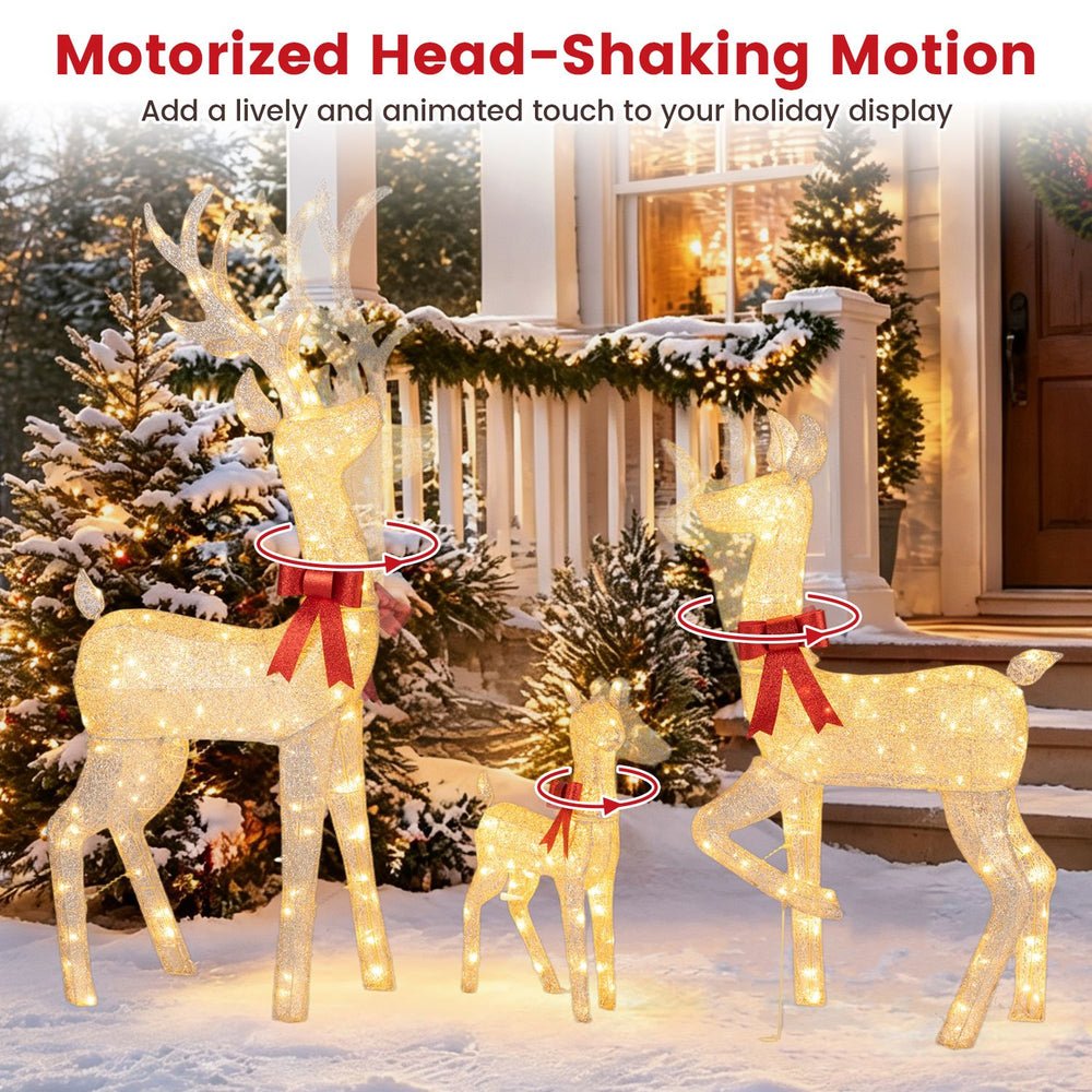 Three-piece lighted golden Christmas reindeer family set with motorized head-shaking motion for festive outdoor displays.