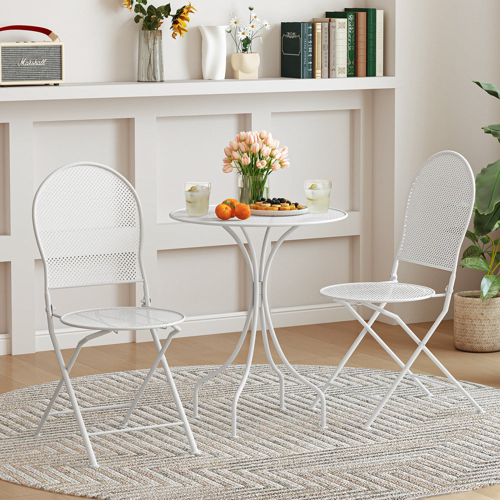 White 3-piece metal bistro set featuring a round table and two folding chairs, perfect for indoor or outdoor use.