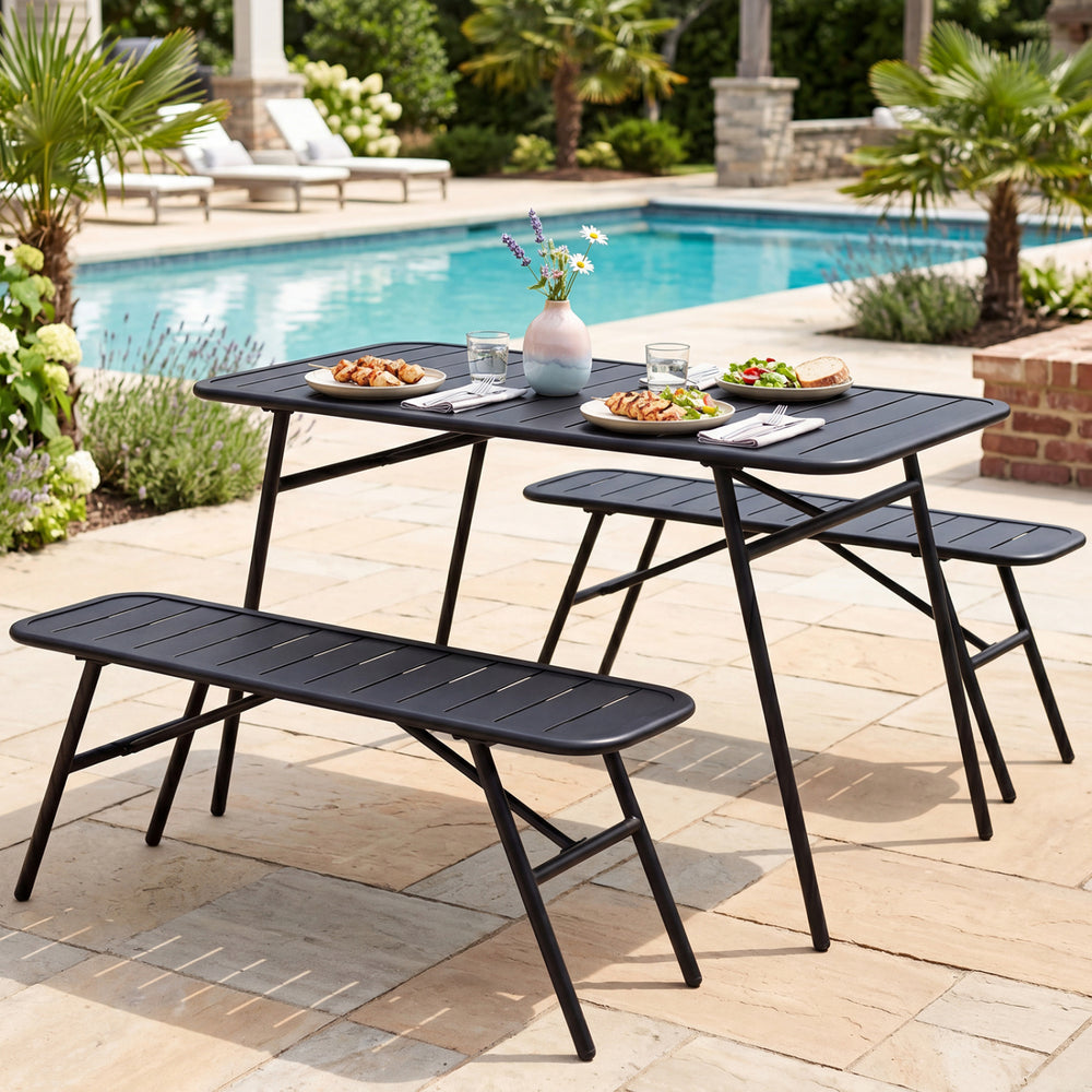 Black metal bench from the 3-piece outdoor dining set, designed for comfort and stability in backyard settings.