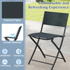 Black folding patio chair with ergonomic 105° backrest, made of breathable fabric, ideal for outdoor relaxation.