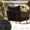 Black round PE rattan chair with soft cushions, designed for outdoor comfort and durability in garden or patio settings.