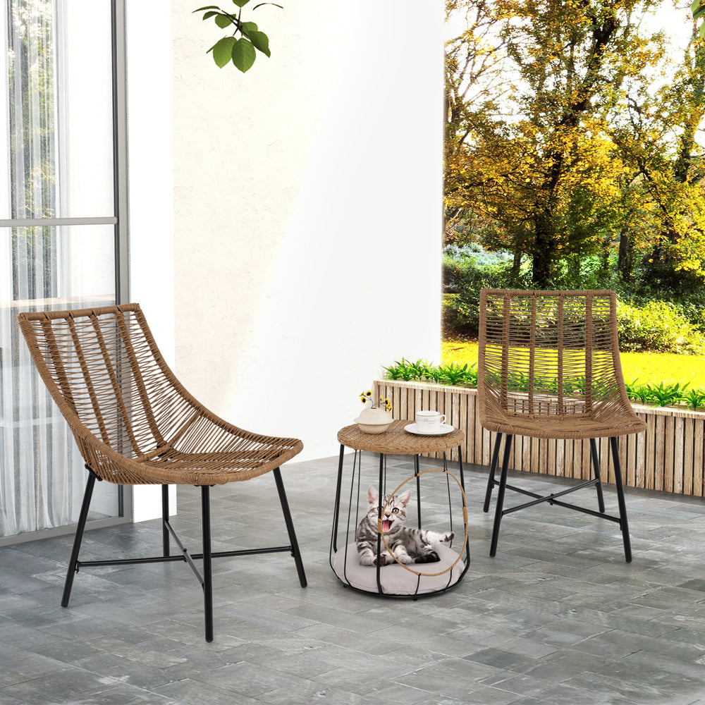 Two ergonomic brown rattan chairs with a side table, perfect for outdoor patio relaxation and pet comfort.