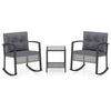 3-piece outdoor rocking chair set in gray with plush cushions and a glass-top table for relaxing garden conversations.