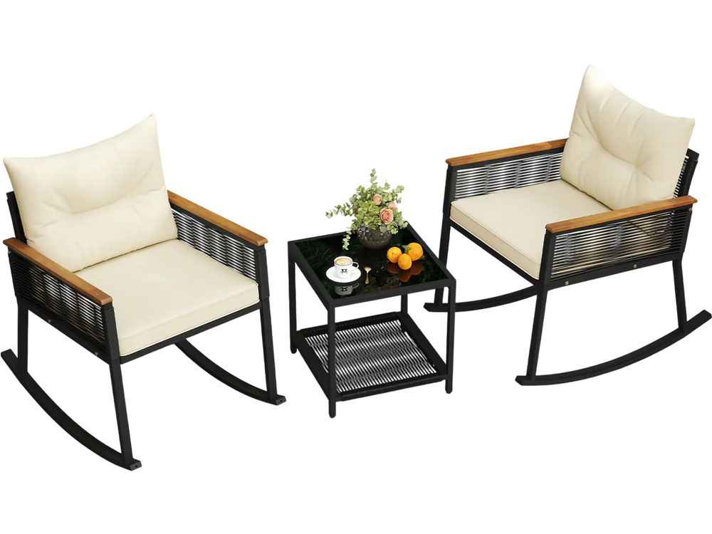 Rocking chair with cream cushion and acacia wood armrests, made of durable black PE rattan for stylish outdoor seating.