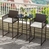 Bar height table and two armchairs in brown PE wicker with white cushions, perfect for outdoor patio relaxation.