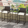 Bar height table and two wicker chairs with white cushions, perfect for outdoor patio or garden relaxation.
