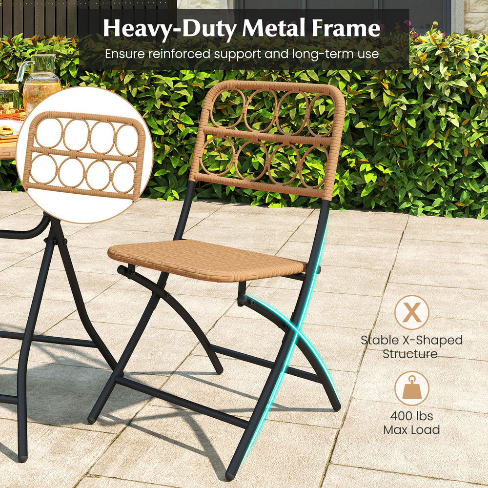 Folding chair with handwoven rattan seat and heavy-duty metal frame, perfect for outdoor patio use.