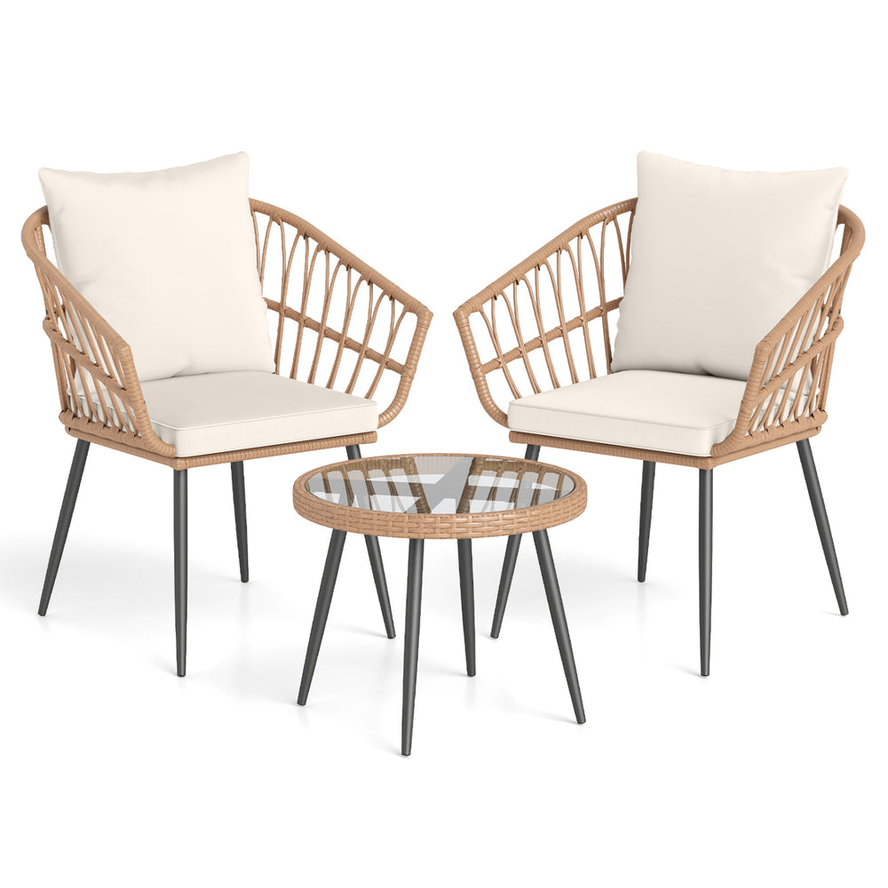Two natural PE rattan wicker chairs with soft cushions and a tempered glass coffee table for outdoor patio use.