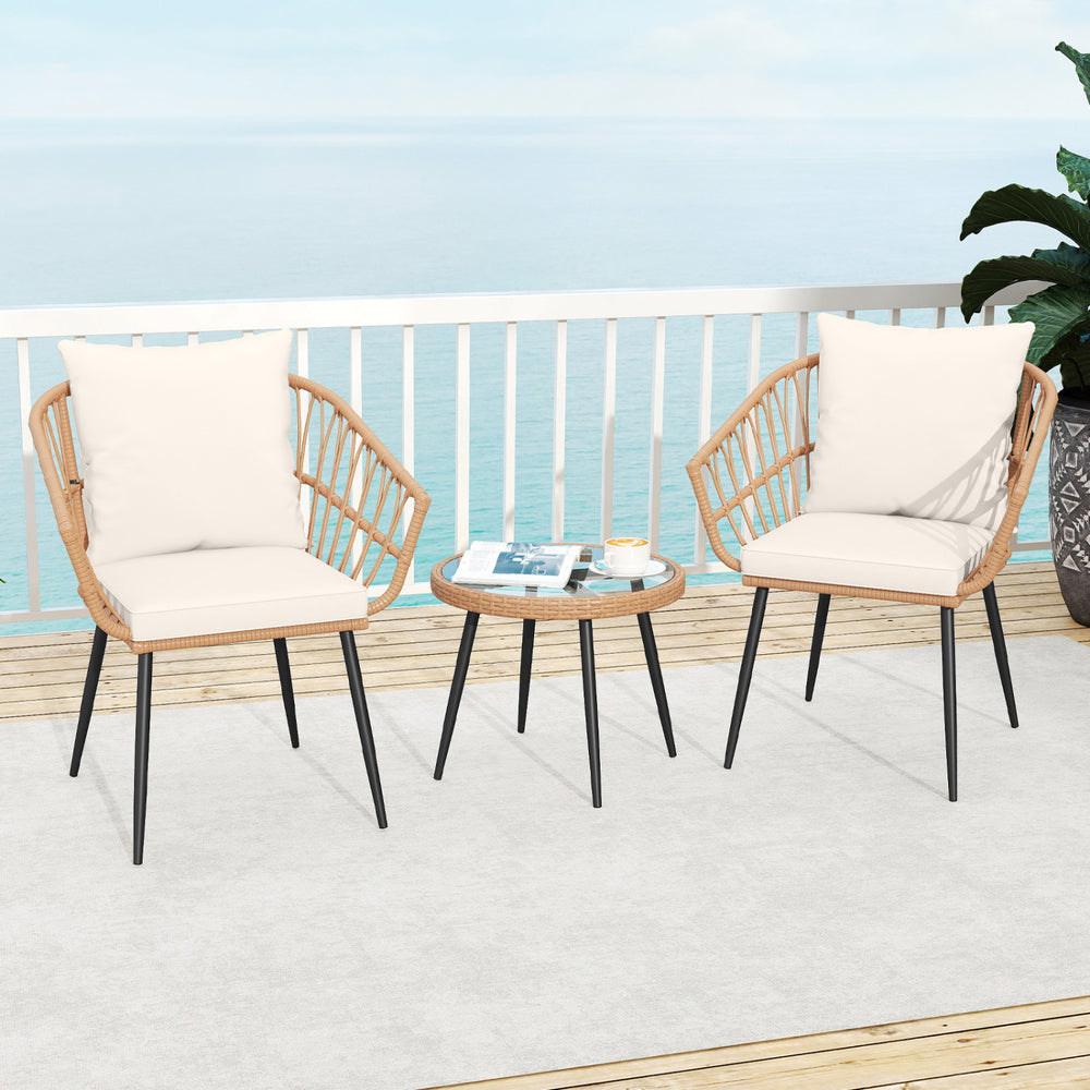 Two PE rattan wicker chairs with soft cushions and a tempered glass coffee table, perfect for outdoor patio use.