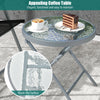 Tempered glass coffee table with ripple-like surface, part of a 3-piece patio folding chair set for outdoor use.