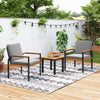 Two grey cushioned chairs with acacia wood armrests and a coffee table, perfect for outdoor patio conversations.