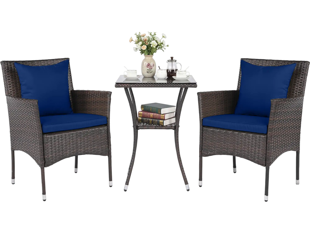 3-piece patio furniture set featuring rattan bistro chairs with navy cushions and a tempered glass side table for.