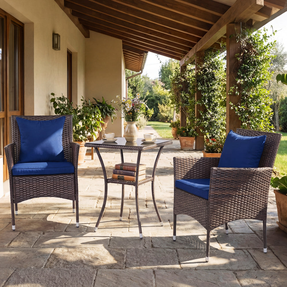 3-piece patio furniture set featuring rattan bistro chairs and a tempered glass side table, ideal for outdoor.
