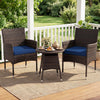 Two navy cushioned chairs and a round table in a 3-piece patio furniture set for outdoor relaxation on a porch.