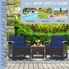 Patio rattan furniture set with navy cushions, featuring a durable steel frame, ideal for poolside or garden use.