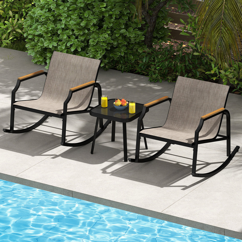 3-piece patio rocking bistro set with breathable fabric seats and tempered glass table, perfect for backyard relaxation.