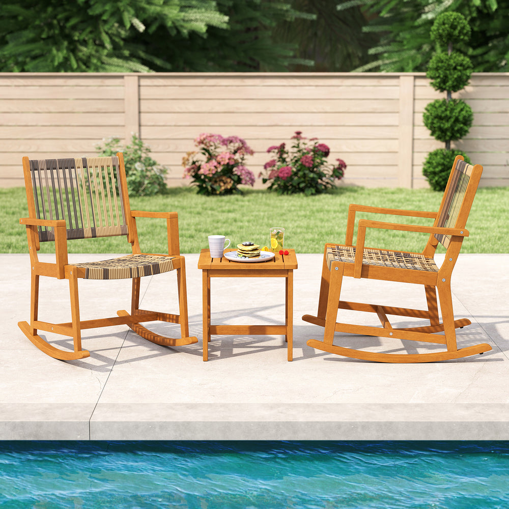 3-piece patio rocking set featuring acacia wood rockers with rattan seats, perfect for poolside relaxation.