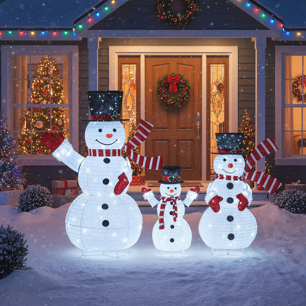 3-piece pre-lit 3D snowman set with 270 LED lights, featuring top hats, scarves, and a stable metal frame for festive.