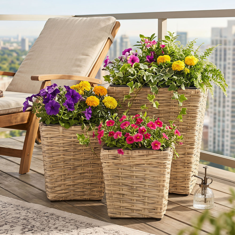 Three sizes of natural rattan planter boxes with removable liners, perfect for planting flowers or herbs outdoors.