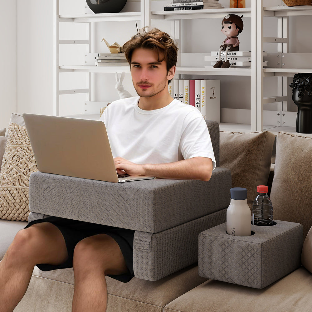 Extra large gray lap desk with ergonomic reading pillow and cup holders, perfect for working or relaxing on the couch.