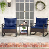 Navy blue rocking bistro set featuring PE rattan chairs and an acacia wood top table, perfect for outdoor relaxation.