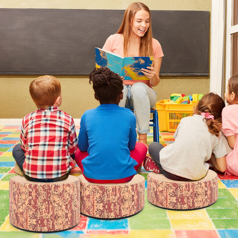 Three tree stump stools with wood printing, perfect for flexible seating in classrooms or play areas.
