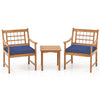 Two acacia wood patio chairs with navy seat cushions and a matching coffee table, perfect for outdoor relaxation.