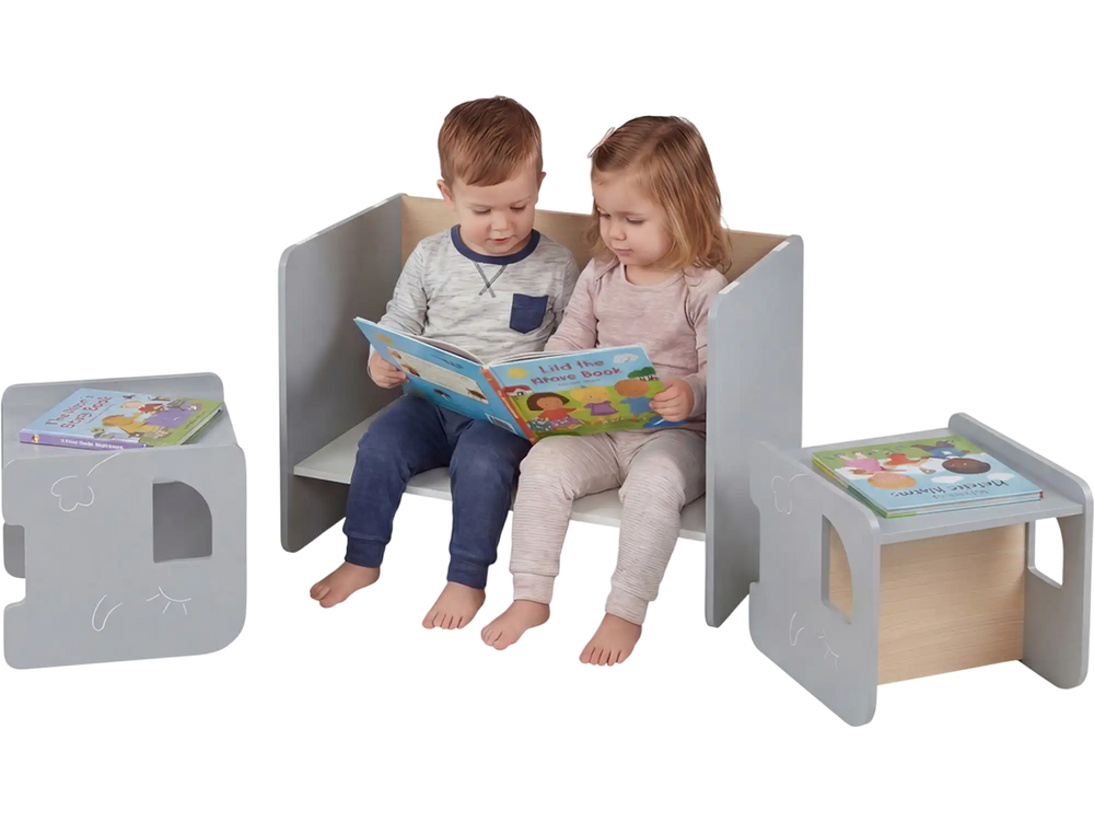 Kids sitting on a gray 3-piece table and chair set, reading books, perfect for playrooms and safe use.