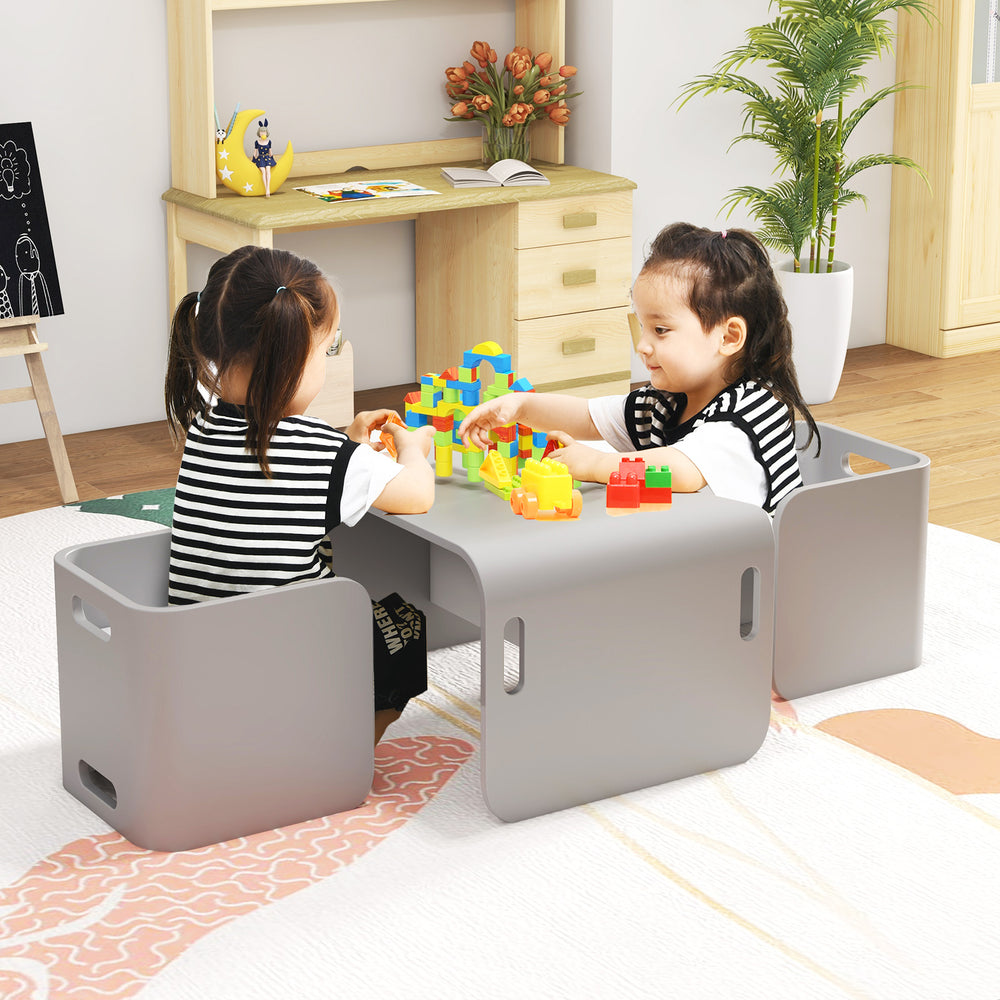 Kids playing at a gray wooden table and chair set, featuring ergonomic design and durable birch wood for safe use.