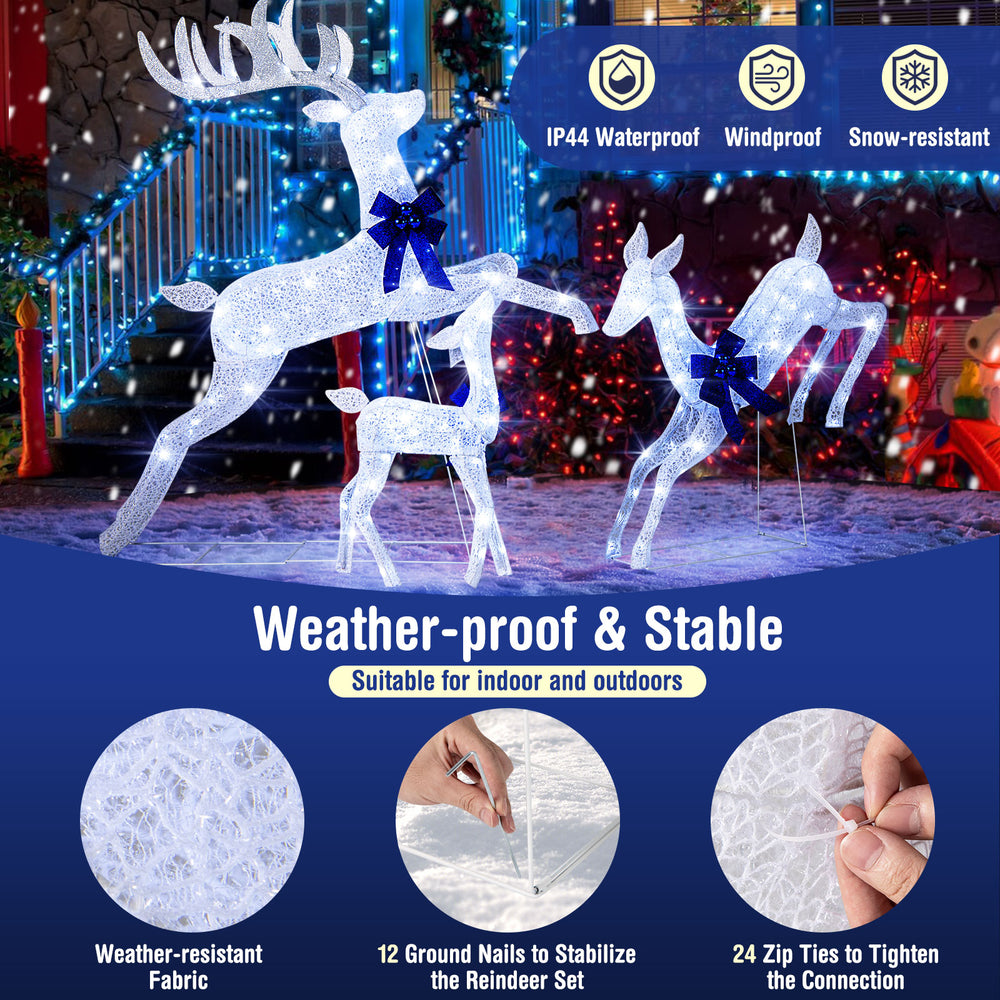 Lighted Christmas reindeer family set with 255 white lights, featuring weather-resistant fabric for indoor and outdoor.