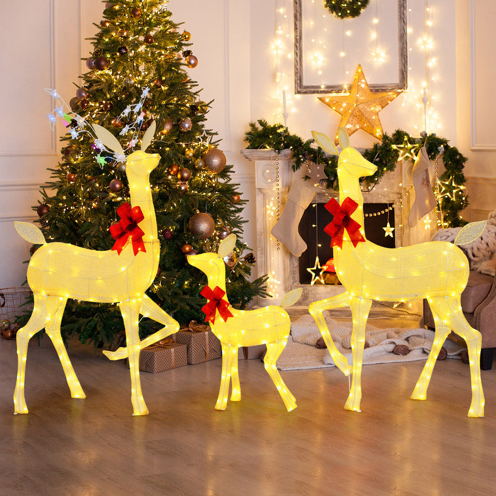 Lighted family deer set featuring 221 LED lights, sturdy metal frame, and decorative bows for festive indoor or outdoor.