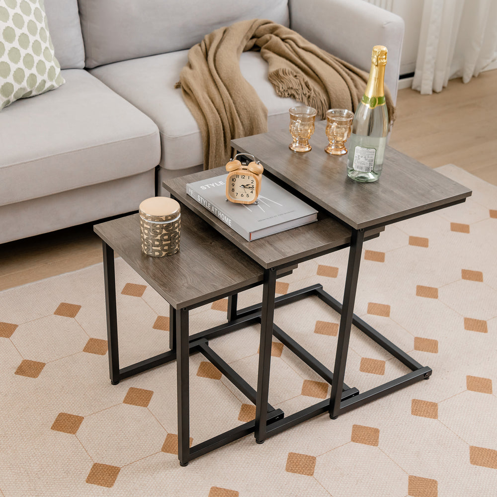 Multifunctional 3-piece coffee end table set in oak with a C-shaped frame, perfect for living room or office use.
