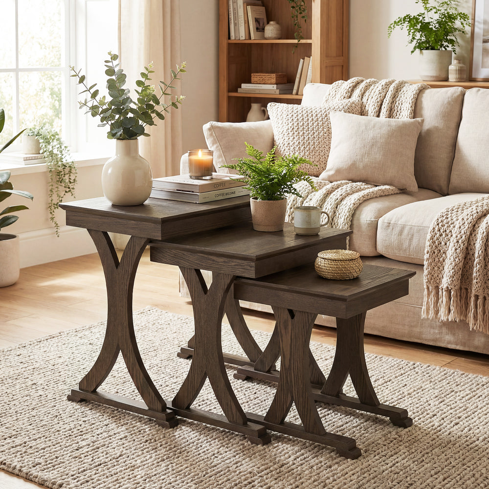 Nesting coffee table set of 3 with solid rubber wood legs in brown, perfect for living room or bedroom organization.