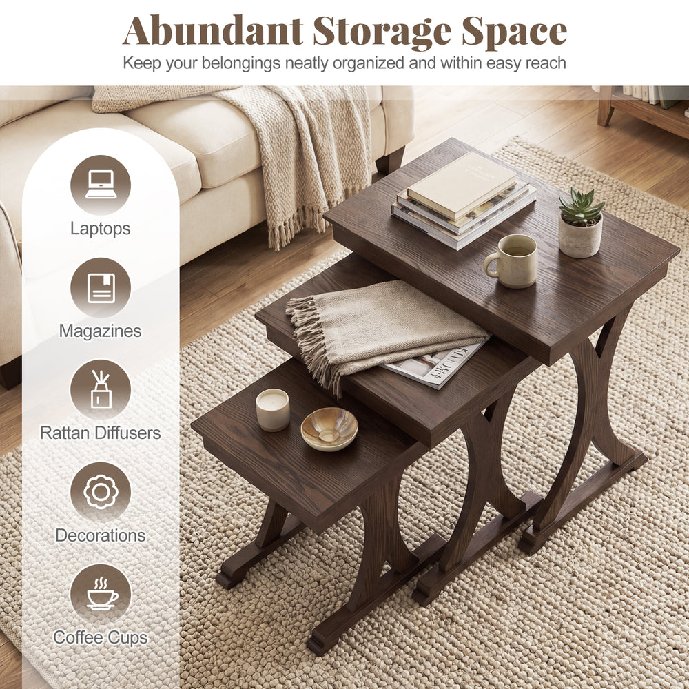 Nesting coffee table set of 3 with solid rubber wood legs in brown, perfect for organizing laptops and magazines.