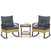 3-piece outdoor rattan rocking chairs set with gray cushions and a 2-tier side table for garden relaxation.