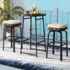 Outdoor swivel bar set featuring a PE rattan table and two cushioned chairs, perfect for patio or poolside use.
