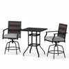 High top patio bar table with two swivel rattan wicker chairs, featuring soft cushions for outdoor relaxation.
