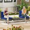 Navy PE rattan conversation chairs with cushions and tempered glass coffee table, perfect for garden or patio settings.
