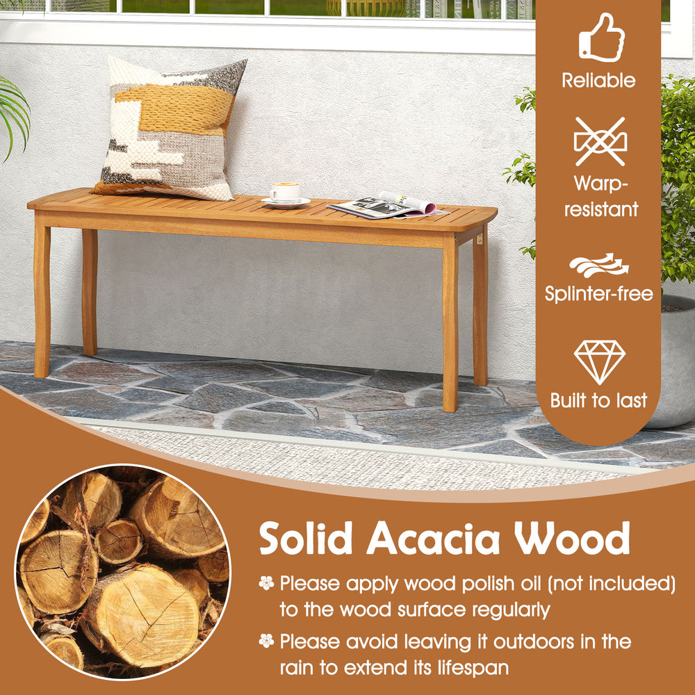 Acacia wood outdoor dining table with slatted design, perfect for patio gatherings and durable for outdoor use.
