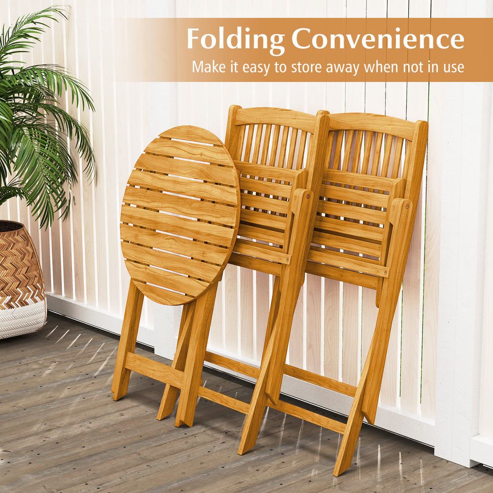 Three acacia wood folding chairs with a round table, showcasing a natural finish, ideal for outdoor dining and storage.