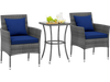 Cushioned patio chairs with navy covers and a tempered glass coffee table, perfect for outdoor relaxation.